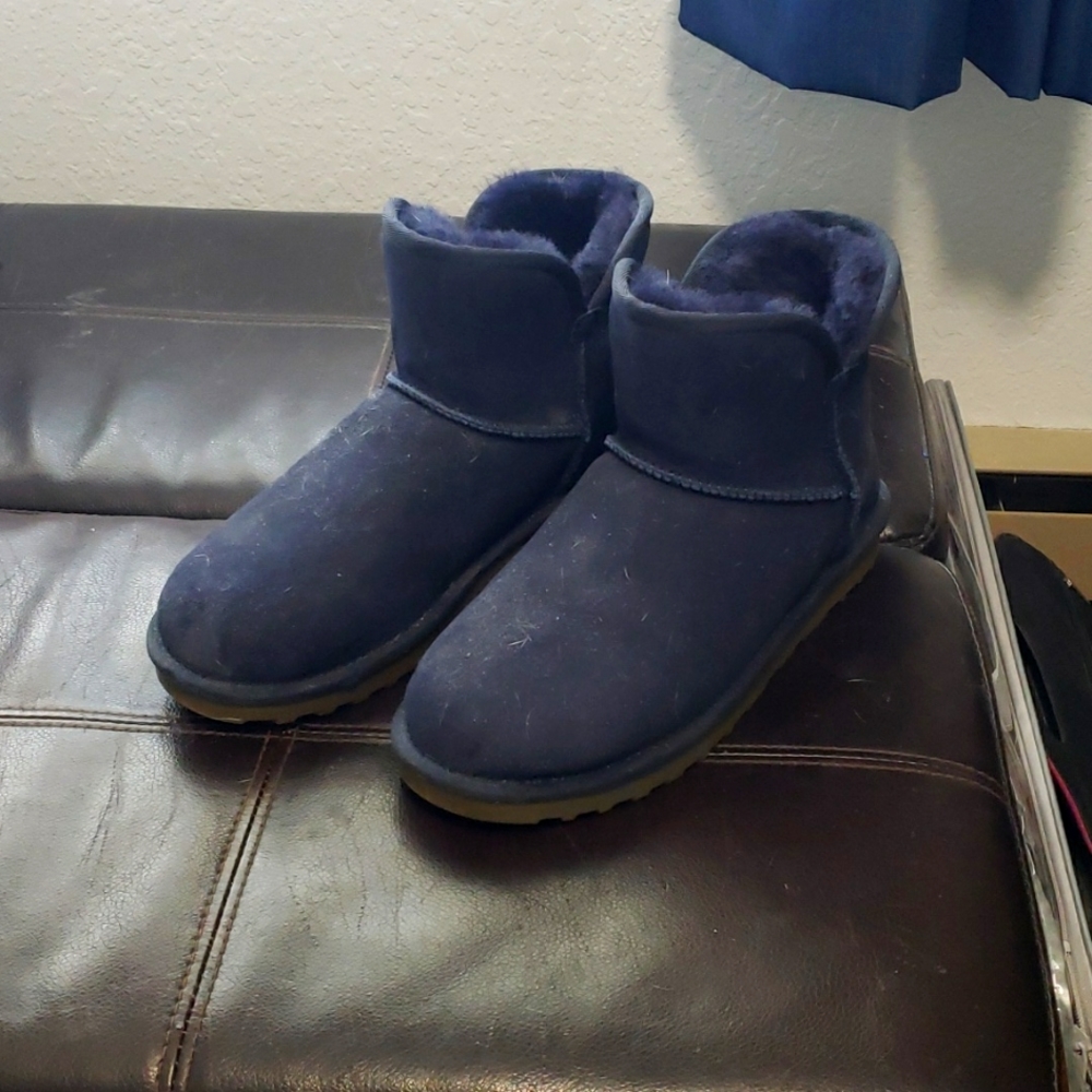 Size 9 women's fleece liked Winter boots.  Dark blue.  New, never worn. Costco